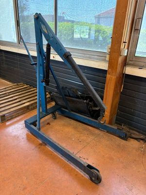a picture of a forklift sitting in a room