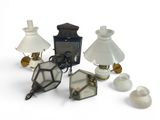 a lot of different lamps that are on a white surface