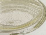 a close up of a microwave with a glass lid