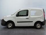 a small white van parked in a parking lot