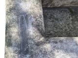 a stone bench with a seat made out of cement