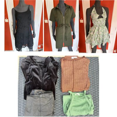 several different types of clothing displayed on mannequins in a store
