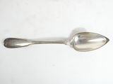 a spoon that is sitting on a table