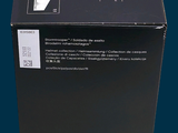 a black box that has a picture of a dog in it
