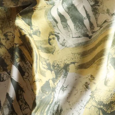 a close up of a fabric with a picture on it