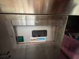 an image of a close up of a machine on a counter