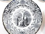 three plates with a picture of a man and a woman on them