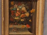 painting of a vase of flowers on a ledge in a gold frame