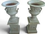 two vases that are sitting on top of each other