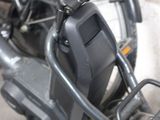 a close up of a bicycle with a basket on the back
