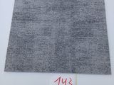 a piece of gray fabric with a red line on it