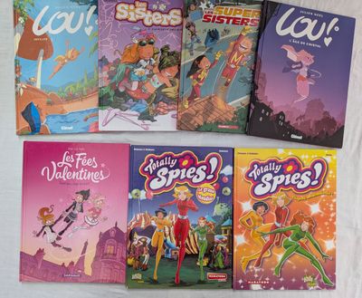 plusieurs livres pour enfants sont alignés sur une surface blanche