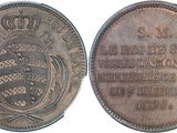a close up of a coin with a crown on it