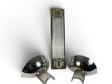 pair of chrome plated door handles on a white background