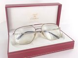 an image of a pair of glasses in a box on a white surface