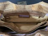 the inside of a purse with a zipper on it