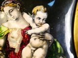 a picture of a painting of a woman holding a baby