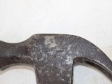 a hammer that is sitting on a table