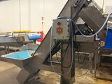 an image of a conveyor belt in a factory