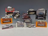 many different models of cars in a display case