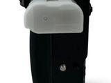 a black and white photo of a lighter on a white background