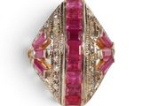 an image of a close up of a ring with pink and yellow stones