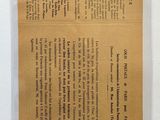 a brown piece of paper with writing on it