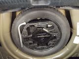 a close up of a tire on the front of a vehicle