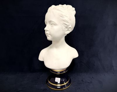 white bust of a woman on a black base with a black background
