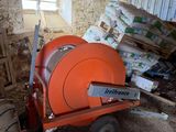 a cement mixer sitting in the middle of a room