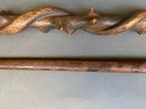 a wooden stick and a wooden stick on a table