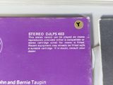 a purple box with a picture of a woman on it