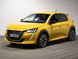 une voiture jaune garée dans un garage au sol en damier