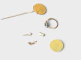 a picture of a gold ring, earring, and a pair of earrings