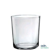 a glass cup that is sitting on a table