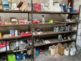 many boxes and boxes on the shelves in the garage