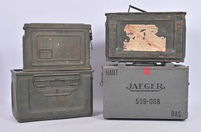 three military boxes are stacked on top of each other on a white surface