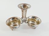 two silver plated candlesticks on a white background