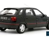 a toy car that is sitting on a white surface