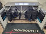 iron body fit gym equipment on display in a store