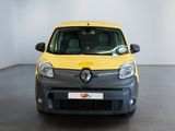 a yellow and grey van that is parked in a room
