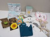 a table with a lot of baby items on it