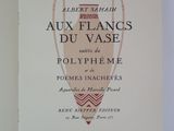 an open book with a picture of a vase on it