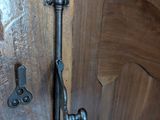 a close up of a door handle on a wooden door