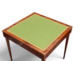 an image of a small table with a green top on a white background