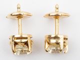 pair of yellow gold tone cufflinks with clear crystal stones