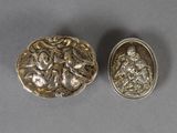 two antique silver brooches, one with a woman and one with a child