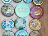 a lot of tins that are on the floor