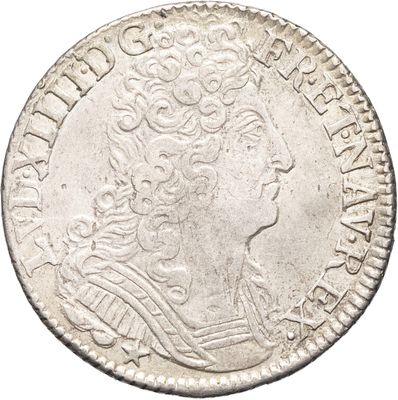 une pièce d'argent portant une tête de femme