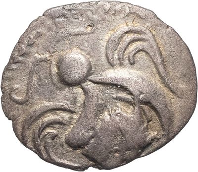 une pièce d'argent sur laquelle est représenté un oiseau